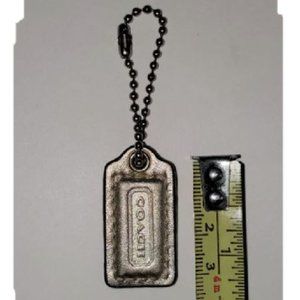 Coach metallic light gold 1-1/2 inch Genuine Leather hang tag lozenge MINI